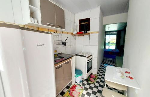 Kitnet Aconchegante com Varanda e Cozinha - Foto 16