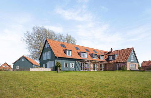 GUT KLETKAMP "Mühlenhof 3" - Ruhige Ferienwohnung mit 2 Schlafzimmern I Terrasse mit See- & Naturblick I Gemeinschaftsgarten I 15 Min zur Ostsee I Küche I Parkplatz I Waschmaschine I WLAN - Foto 12