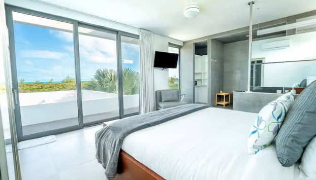 Entire Villa in Long Bay Beach - Foto 2, Habitación