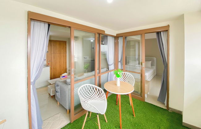 Homey and Nice 1BR at LRT City Jatibening Apartment - Photo 1