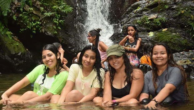 Taking a dip at the waterfalls of El Naranjal