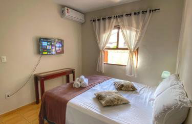 Casa aconchegante à 400m da Praia da Tartaruga - Ar condicionado - WIFI 450MB - Netflix - Cozinha Completa - Garagem - Foto 1