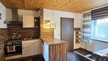 Ferienhaus Baumann mit Garten - Photo 5, stove