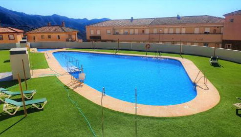 Apartamento nuevo con piscina en la envía golf aguadulce Almería - Foto 4, Garden, sunbed