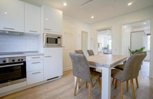 Sonnenterrasse - Helle & moderne Ferienwohnung am Meer - Foto 8