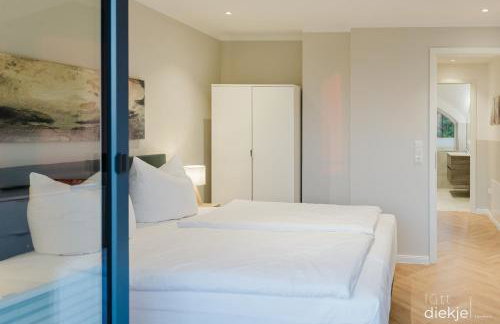 Lütt Diekje - Luxus-Haus mit Meerblick, Sauna & Kamin - Photo 12