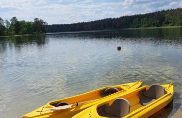 Domki przy jeziorze z prywatną plażą w Borach Tucholskich Pensjonat Alicja wczasy z dziećmi nowe luksusowe domki na skraju jeziora i lasu - Foto 46