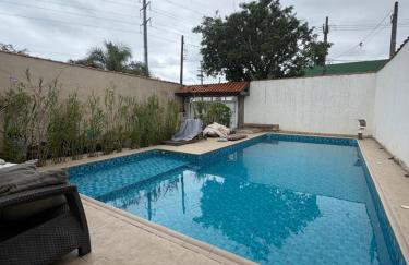 Casa Praia Grande 5min praia, 2 vagas, wi fi , 3 banheiros , piscina grande , freezer extra gelo , churrasqueira , até 9 pessoas - Photo 42