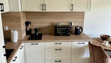 Urokliwy Apartament z dużym tarasem i widokiem na Jezioro Białe - Foto 5, stove