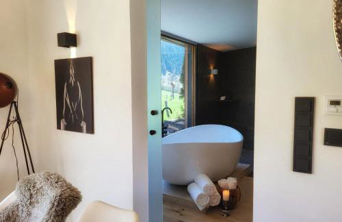 stylische Alpenlounge mit Pool, Blockhaus-Sauna und Jacuzzi für bis zu 12 Personen - Foto 22