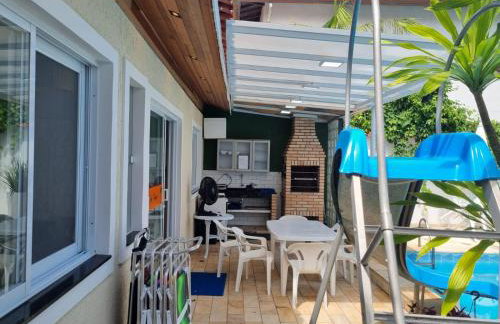 Casa Premium Piscina Privativa Gigante com Escorregador Próxima à Praia - Foto 21