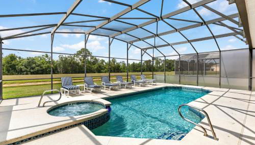 Family Friendly Emerald Island Resort Vacation Home with Private Pool and Spa Near Disney - Foto 2, sunbed
