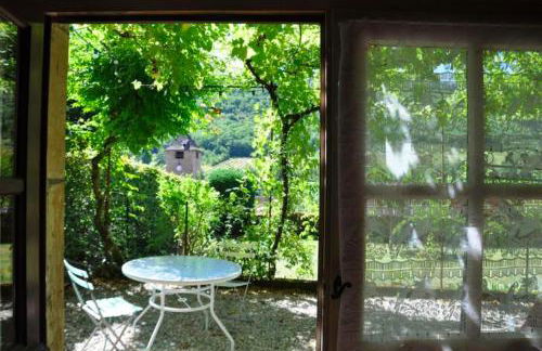 Séjour à deux au Château d'Autoire, studio de charme, tonnelle, vue vallée et village - Foto 16