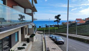 Un rincón con vistas a la Ría, playa y parking. - Foto 2