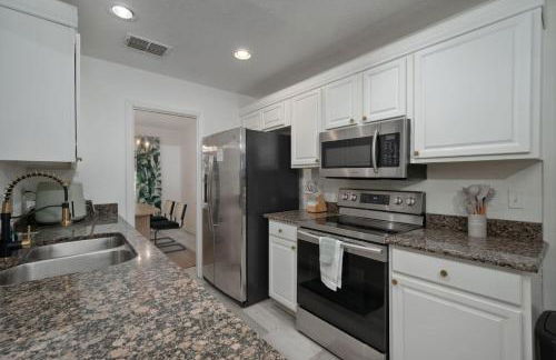 Family Retreat with Game Room and Fireplace - Photo 13