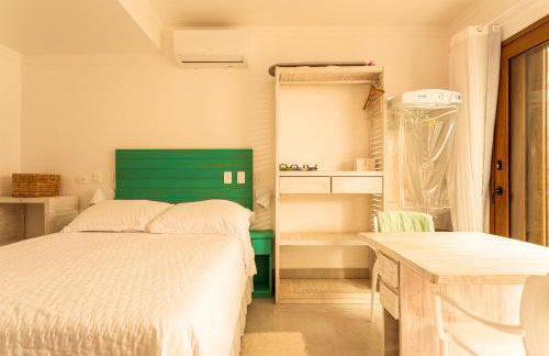 Casa d'Aroeira Residencial Boutique - Centro de Juqueí - Perto de Tudo - 2 quadras do Mar - Serviço de Praia - Roupa de Cama 600 fios algodão Egípcio - Tudo Novo - Estacionamento Interno - Cozinha - Consulte unidades com Ofurô Hidro e Cromoterapia - Foto 21