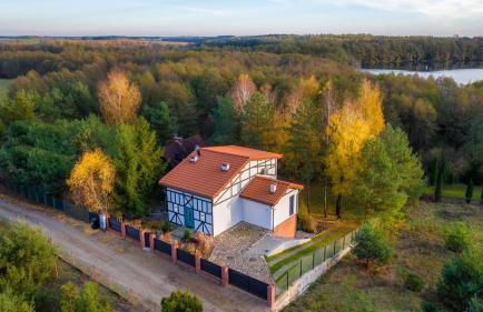 Nowoczesny dom nad jeziorem Zarybinek-Mazury Rybno, z własnym dostępem do linii brzegowej oraz łódką - Foto 56