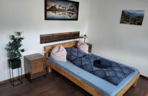 Einzelwohnung im EG mit Terrasse und AC - Foto 1