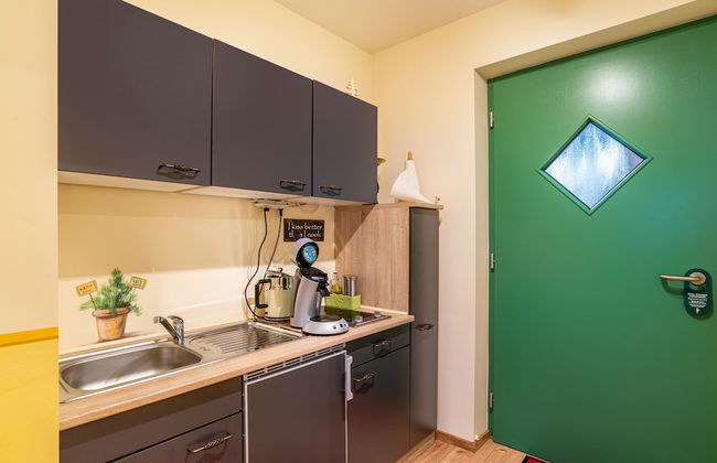 SCHUSTERjunge APARTHOTEL - Photo 17