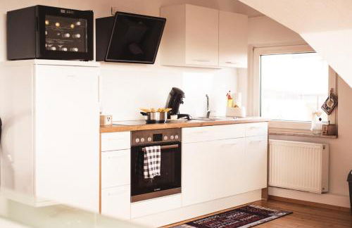 Pfälzer Herzel mit 2 Schlafzimmern und Blick über die Rheinebene kostenfreiem Parkplatz und Wlan fußläufig zum Wald und den Weinbergen Weinkühlschrank Brötchenservice Garten mit Gasgrill - Foto 26