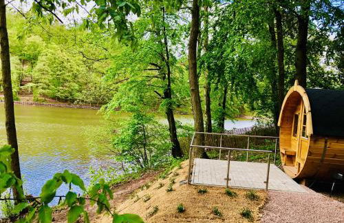 Ferienwohnungen & Campingfässer am Kunstteich - Foto 2