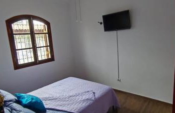 Casa Rosa de Peruíbe - Casa de Temporada 3 dormitórios, 10 hóspedes, piscina, wi-fi, netflix, 800 metros da praia - Photo 30