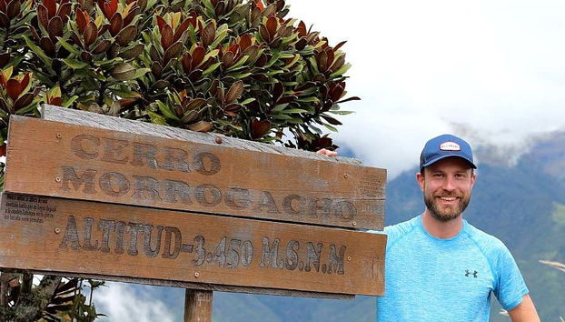 Taking a photo with the Cerro Morrogacho sign
