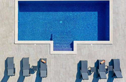 Luxury Villa Nature with heated private pool, sauna & fire pit, a short walk to the beach - Photo 27