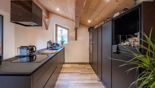 Triplex chaleureux Huez Village à 20m des remontées - Photo 4, stove