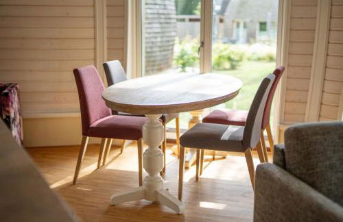 Kugelhaus Kia - Modernes Kugelhaus mit klarer Linie und Naturbezug am Tollensesee - Foto 8