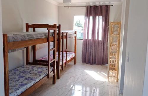 Casa Dulé, a poucos metros da praia - Foto 13