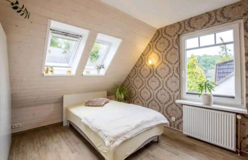 Dachgeschosswohnung Scharbeutz mit Garten - Foto 7