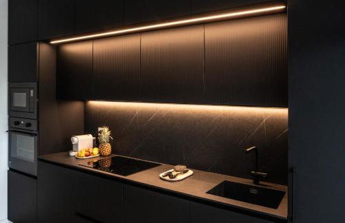 LuxeDesign Apartment - Photo 9