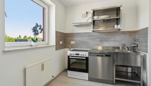 Work & Stay Apartment mit Balkon in Bergkamen - Foto 3, stove, dishwasher