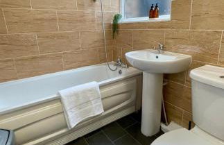 Spacious 3 Bed Home with Free Parking - Photo 8