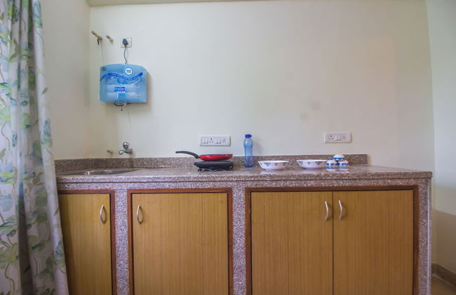 OYO 18705 Home Elegant 2BHK Parra - Foto 9