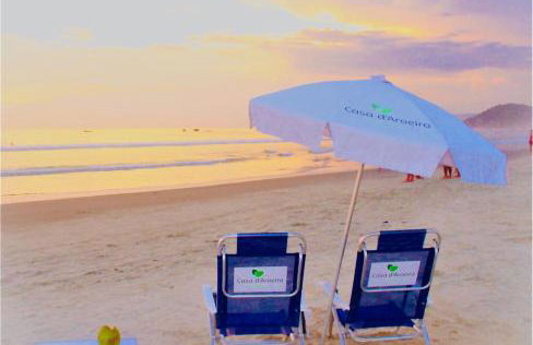 Casa d'Aroeira Residencial Boutique - Centro de Juqueí - Perto de Tudo - 2 quadras do Mar - Serviço de Praia - Roupa de Cama 600 fios algodão Egípcio - Tudo Novo - Estacionamento Interno - Cozinha - Consulte unidades com Ofurô Hidro e Cromoterapia - Foto 1