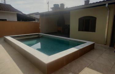 Casa piscina com ozônio churrasqueira perto da praia - Foto 3