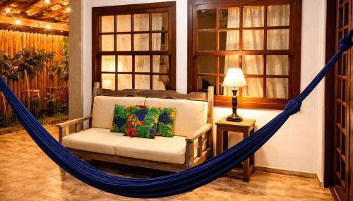 Casa charmosa em condomínio com piscina, churrasqueira e 3 banheiros a 5 min da praia em Manguinhos - Foto 3