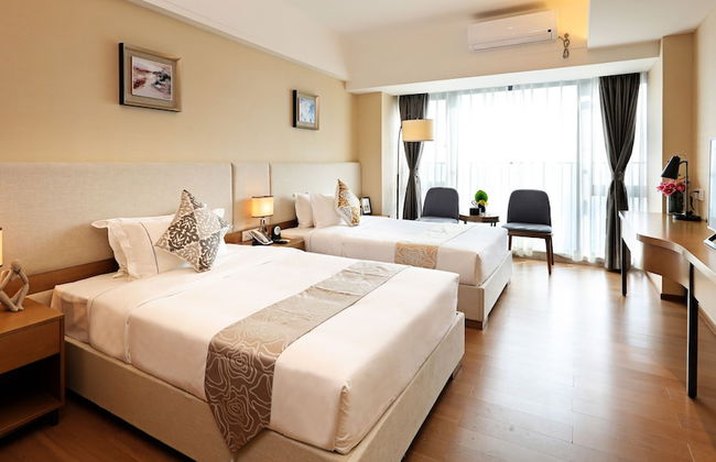 Yuwa Serviced ApartHotel - Photo 18