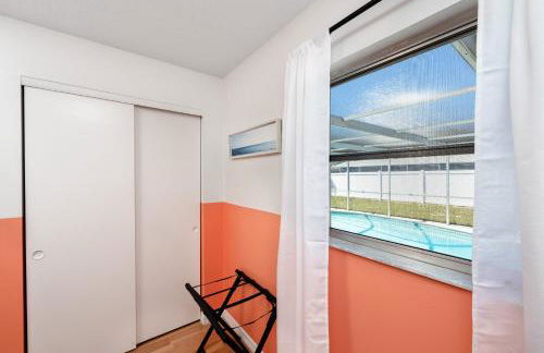 Sunny Escape: Vibrant Pool Home - Photo 14