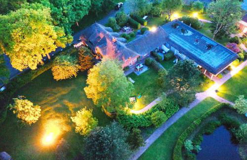 Sky & Sand Homes Strandläufer I Stilvolle Wohnung unter Reet in SPO mit Parkgarten - Photo 25