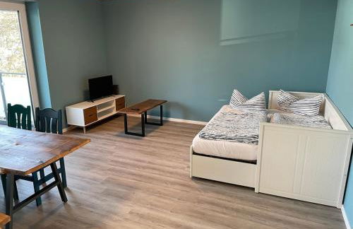 Zentrale Neubauwohnung mit Balkon - Foto 4