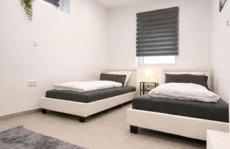 STN Apartment Suite - Ferienwohnung mit 2 Schlafzimmer & Parkplatz, Highspeed WLAN, Fußbodenheizung & Netflix Premium, Zentral zu Audi & Schwarz Gruppe - Foto 11