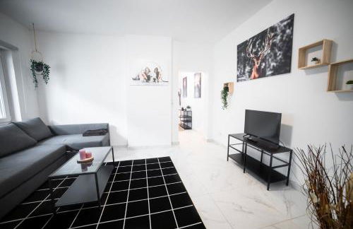 Nord-Apartment 3 I 1 Zimmer mit großzügigen Wohnbereich & Fußbodenheizung - Photo 1