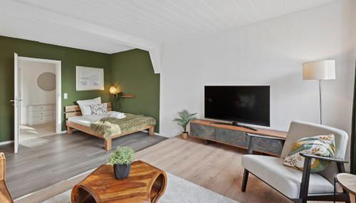 MAISUITES Sperling - Zentrale Ferienwohnung mit Boxspringbett, Kaffeevollautomat, WLAN & seitlichem Seeblick - Foto 4