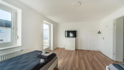 Monteur- & Gästewohnung mit Küche, WLAN & Parkplatz - SCH04 - Foto 4