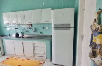 Casa 30 metros da praia com wifi e garagem 6 carros - Photo 13