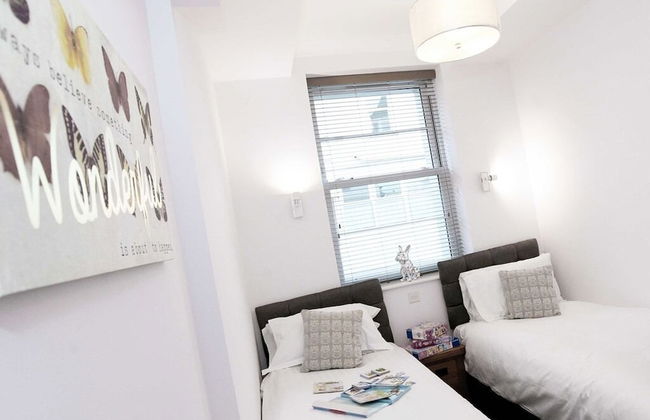 Austen's Luxury Apartments - Foto 16