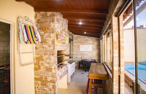 Casa 3 min Shopping Pelotas- Com 1 Suíte, 2 Quartos Climatizados, Piscina e Estacionamento 2 carros - Foto 53